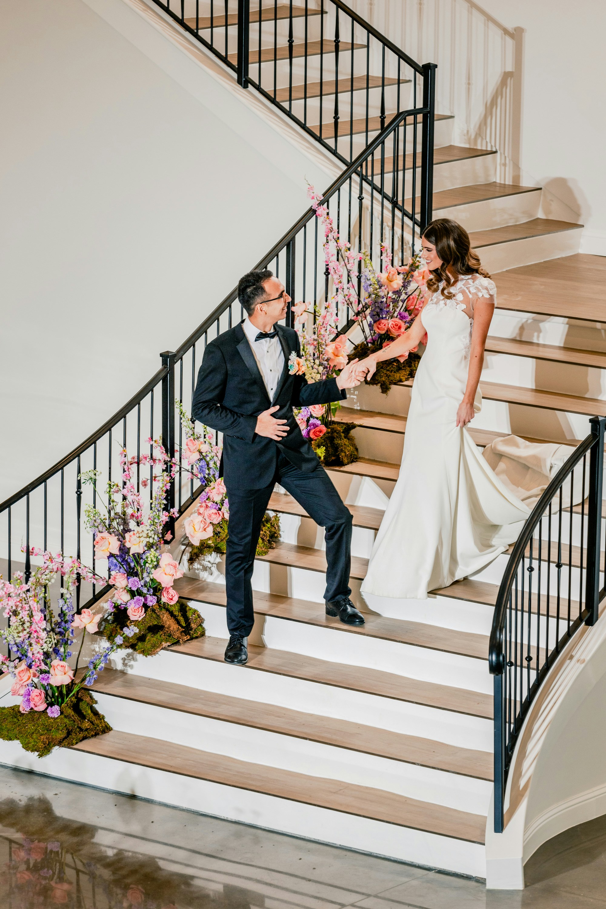 bride and groom on the stairs